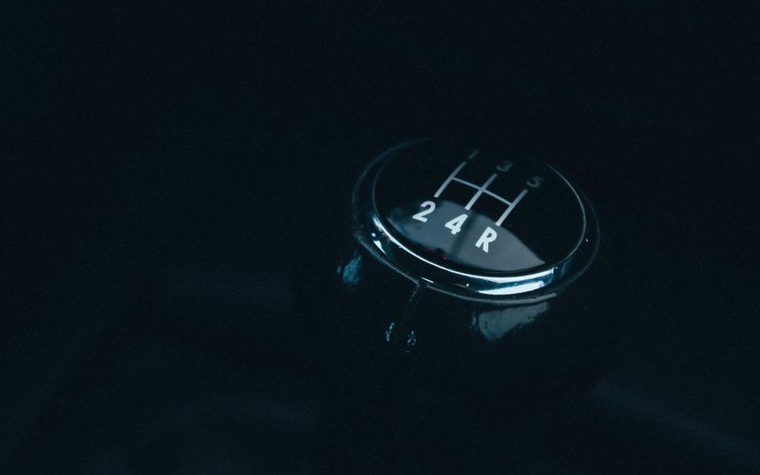 Gear selector on a car, illustrating transmission warning signs